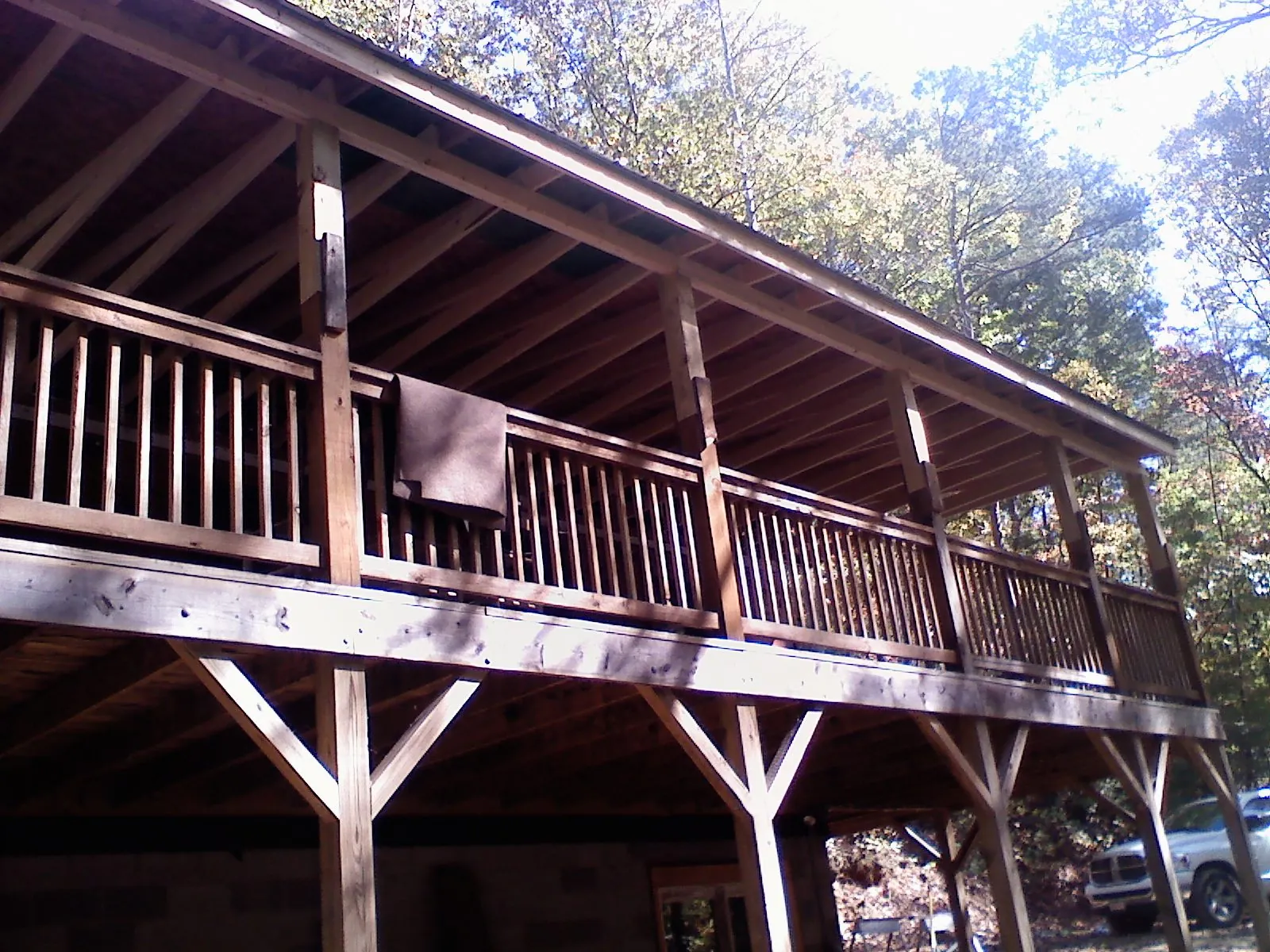 Timber framing under a new elevated porch and deck — Roof Leak Repair in Avon Lake by Roofing Brothers